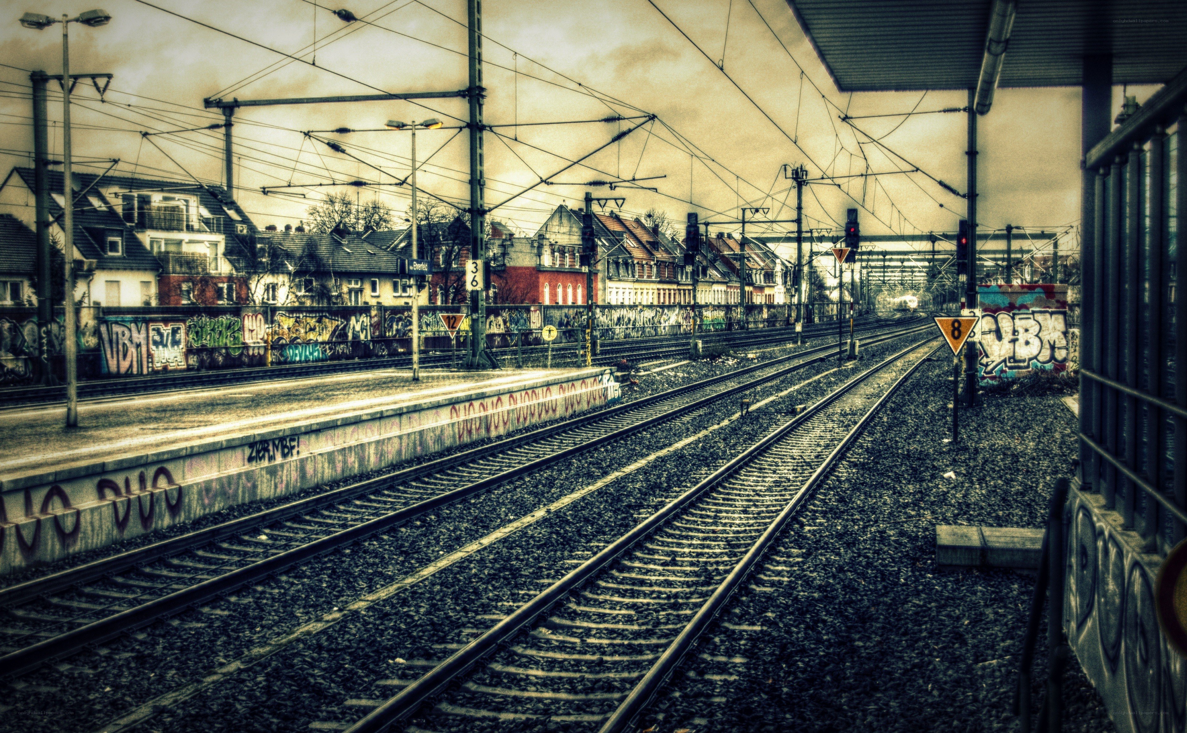 train tracks with graffiti