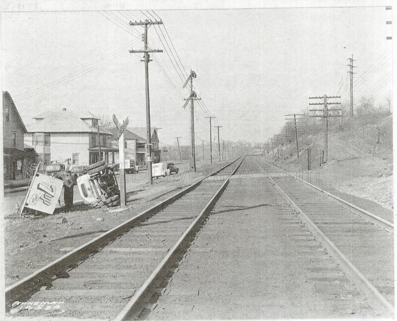 Train tracks with overturned vehicle