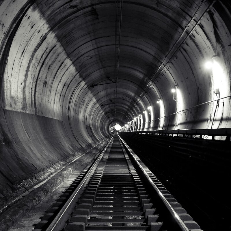 train tunnel with tracks