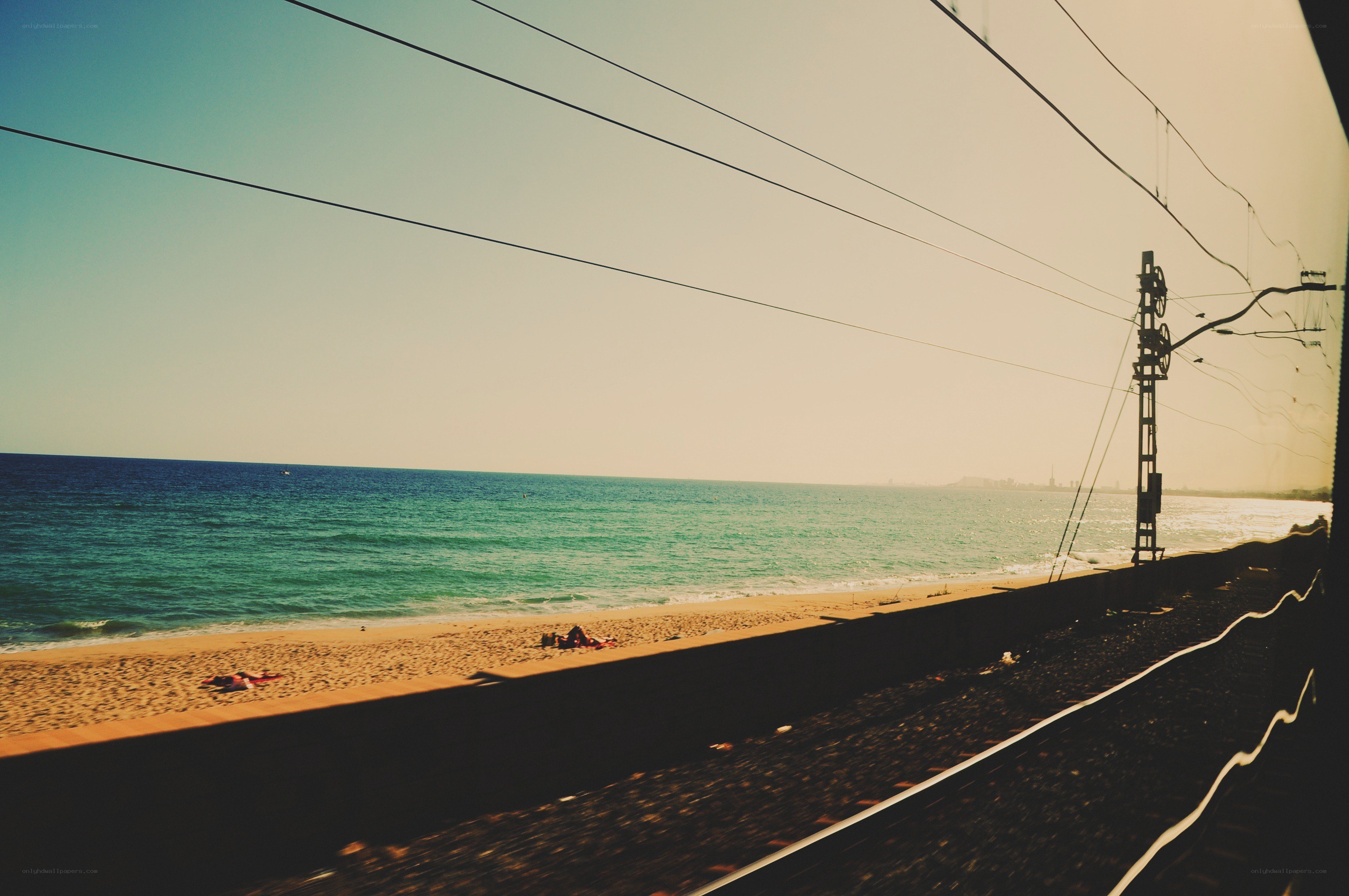 Train view of beach and ocean