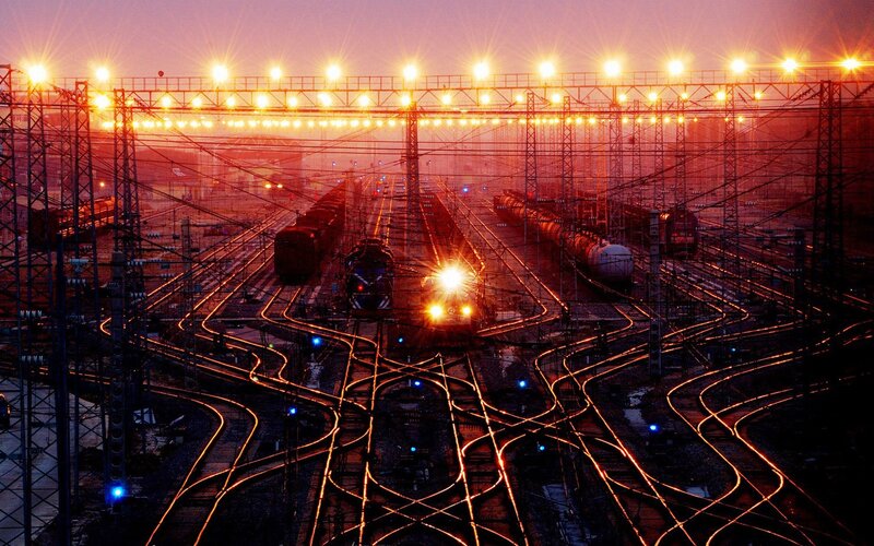 Train yard at dusk