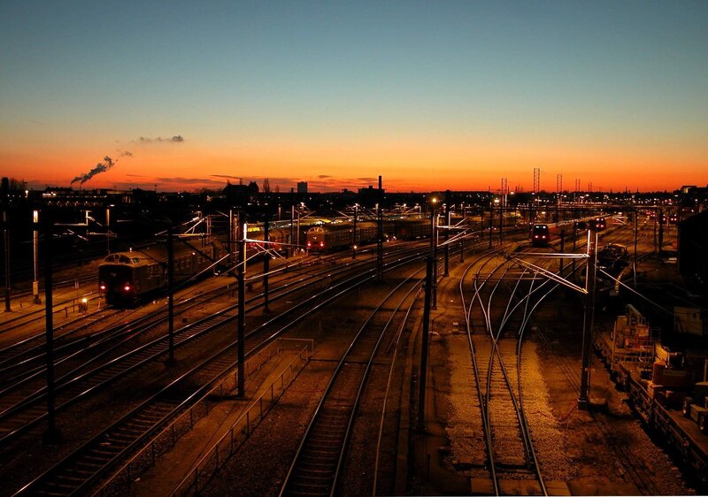 Train Yard at Dusk — Orange
