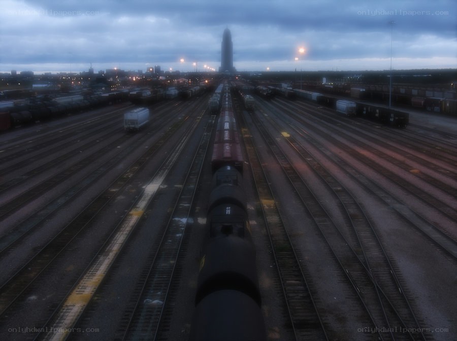Train yard at dusk