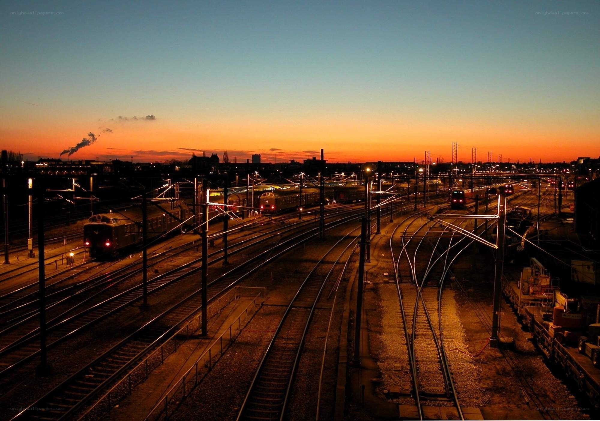 Train yard at sunset