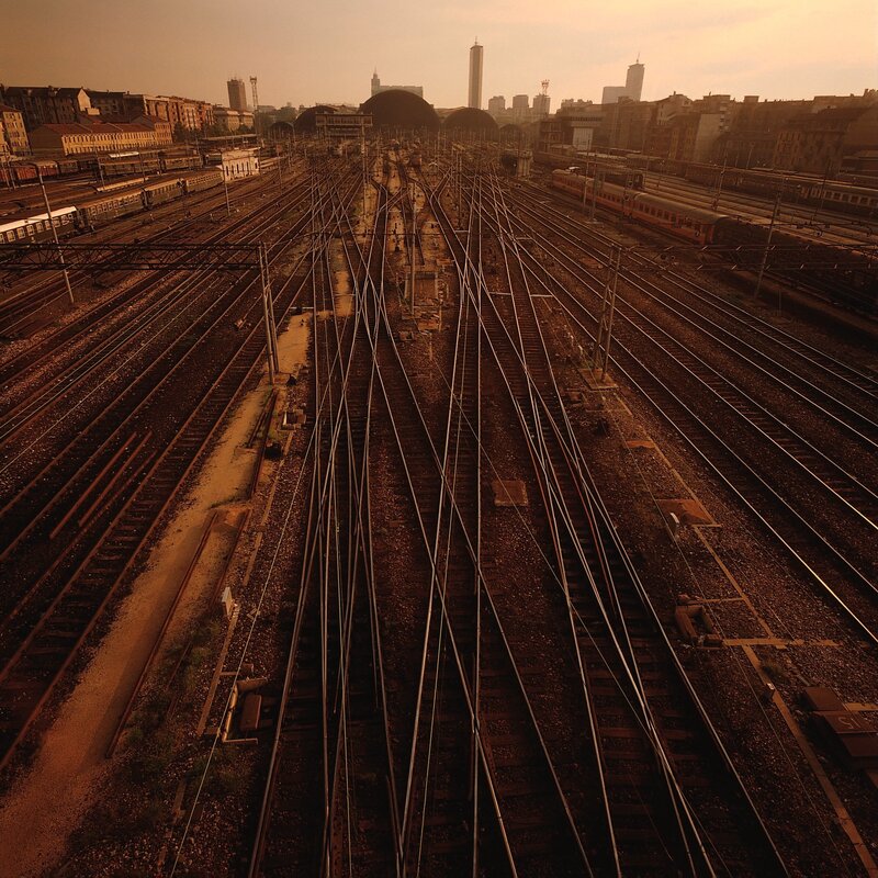Train Yard at Sunset — Brown, Dramatic