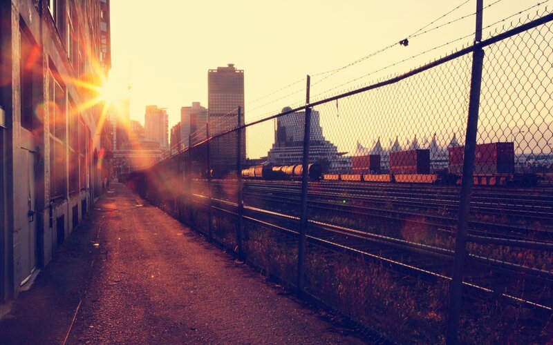 Train Yard at Sunset — Orange, Dramatic