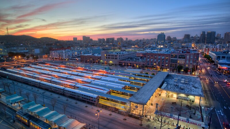 Train Yard at Sunset — Orange