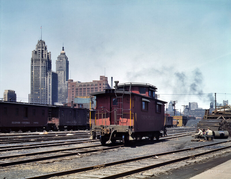 Train yard with city skyline