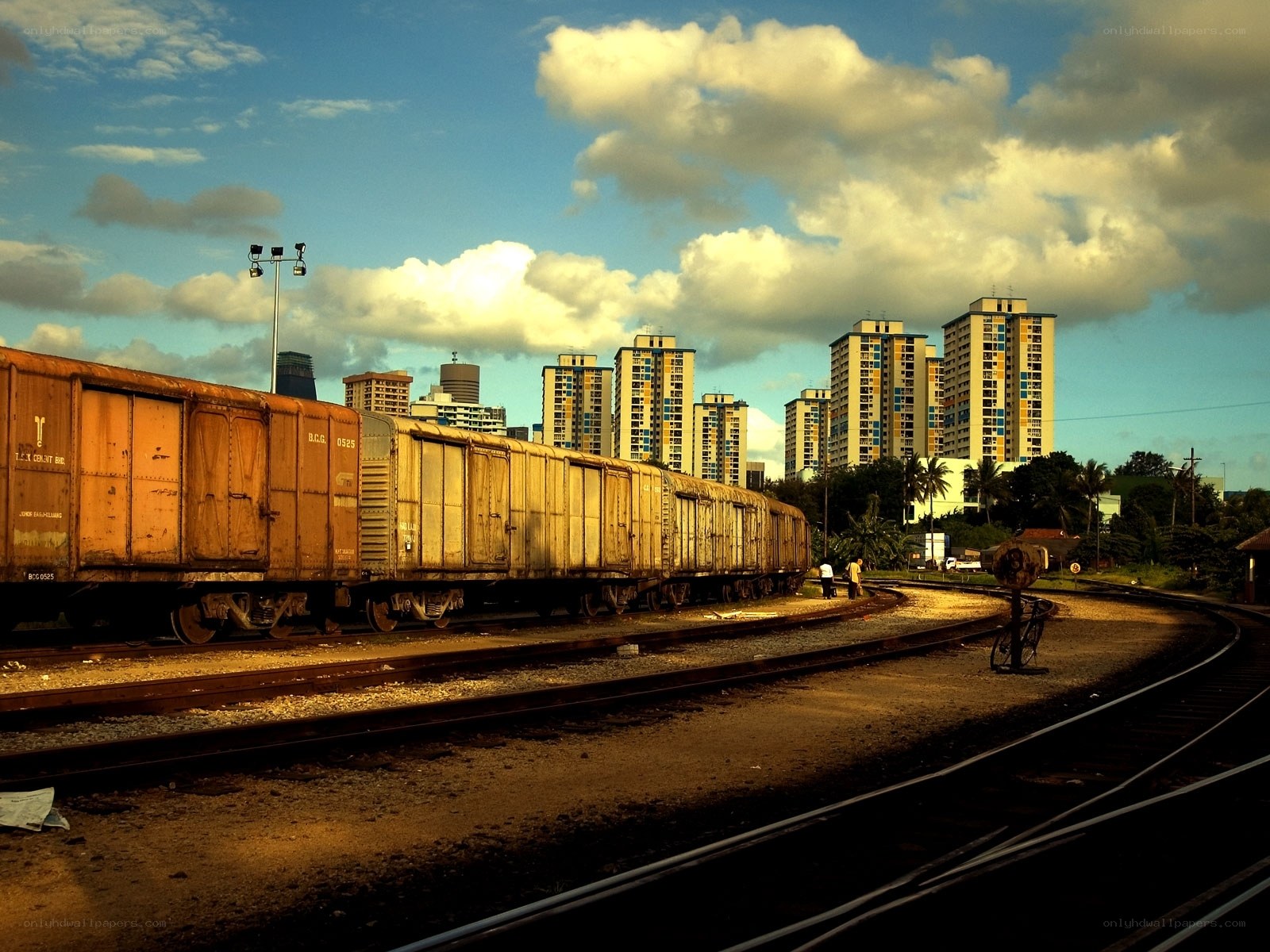 Train yard with city skyline