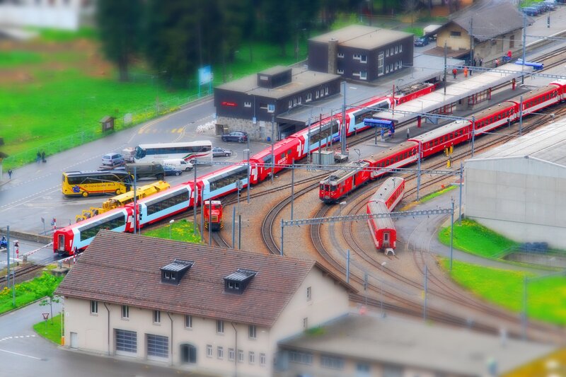 Train yard with red trains