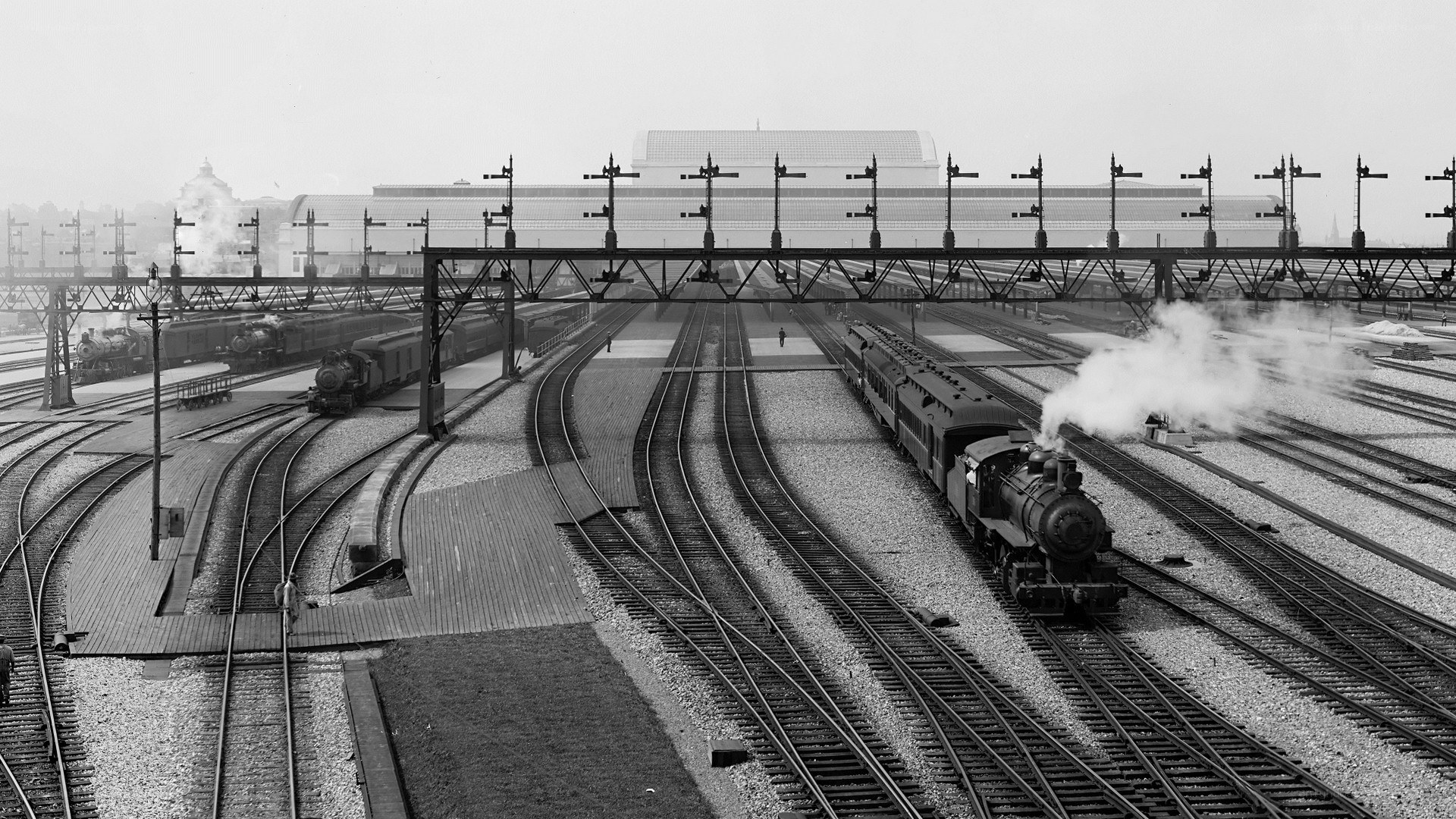 Train yard with steam locomotives