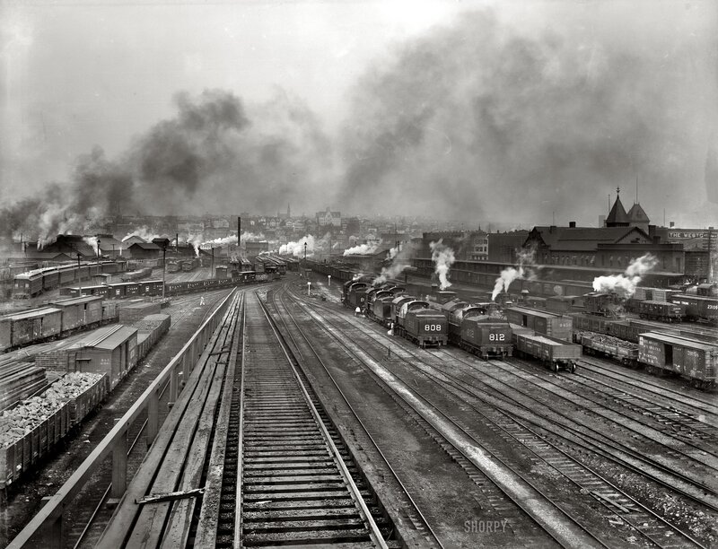 Train yard with steam locomotives