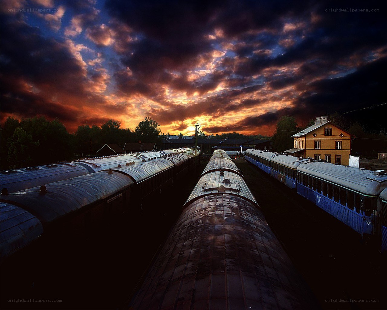 Trains at sunset station