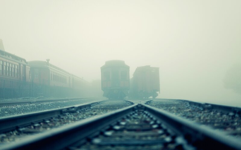 Trains on Foggy Tracks