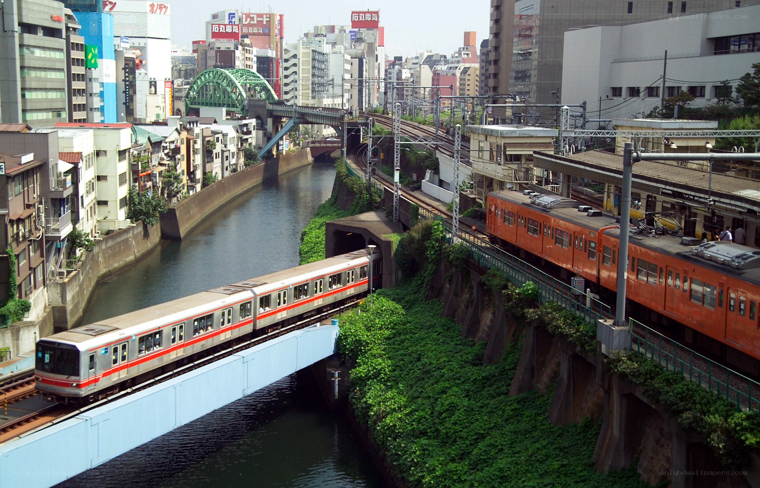 Trains over a canal in Tokyo