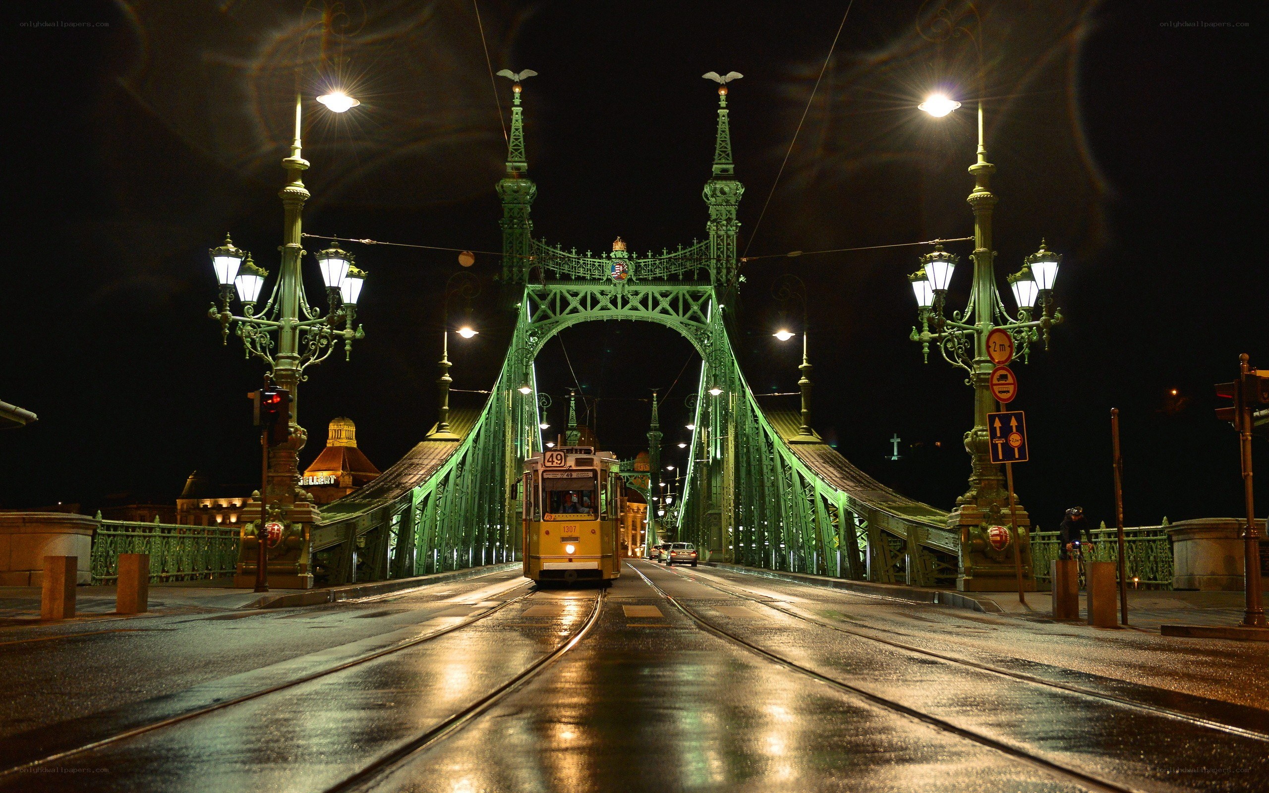 Tram on Liberty Bridge at night