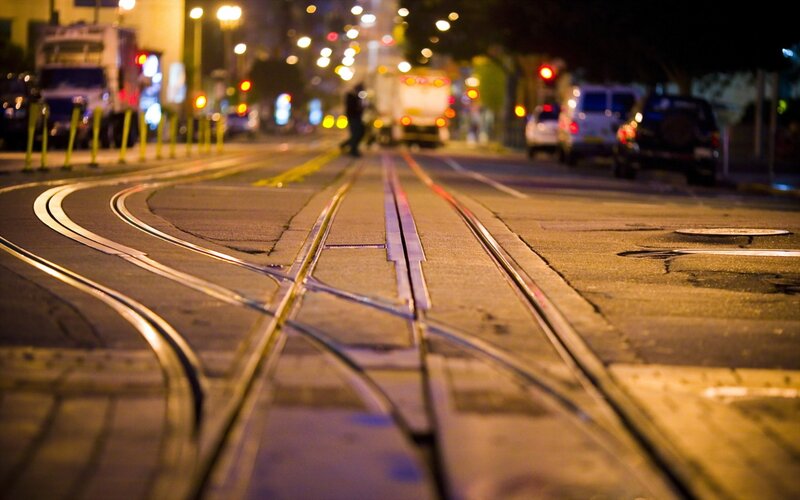 Tram tracks at night in the city