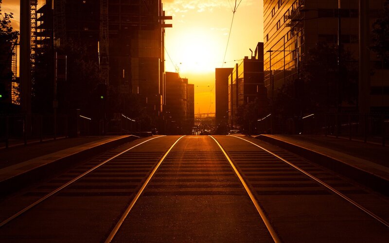 Tram Tracks at Sunset — Orange, Dramatic, Photograph, Buildings