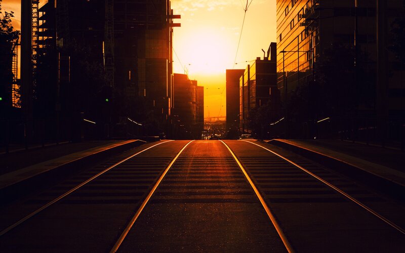Tram Tracks at Sunset — Orange, Dramatic