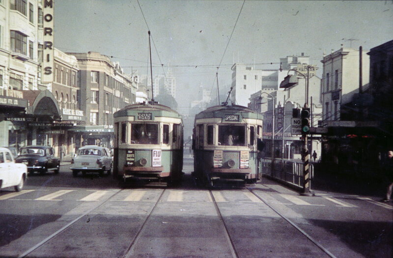 Trams at a city intersection
