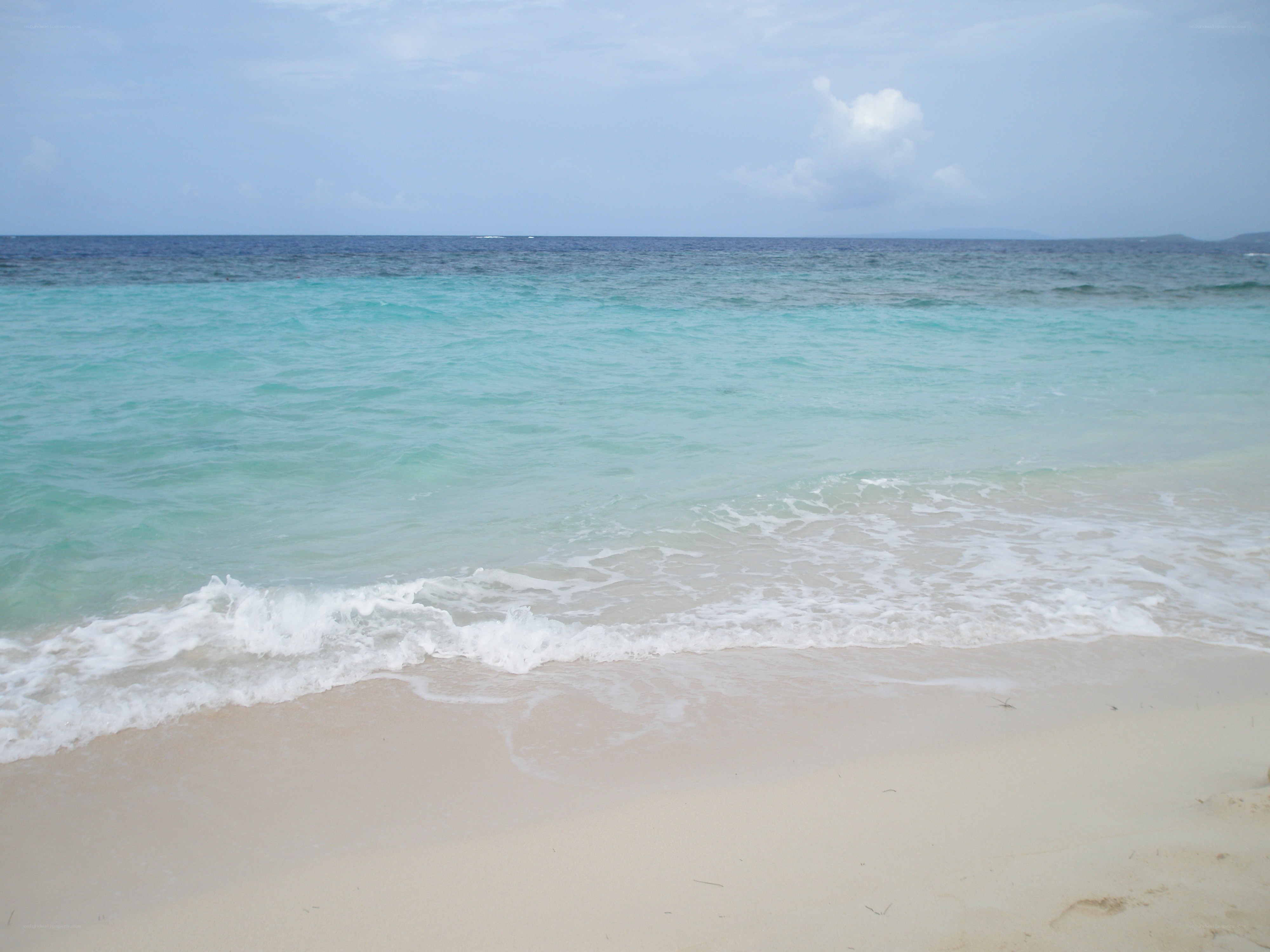 tranquil beach with turquoise water