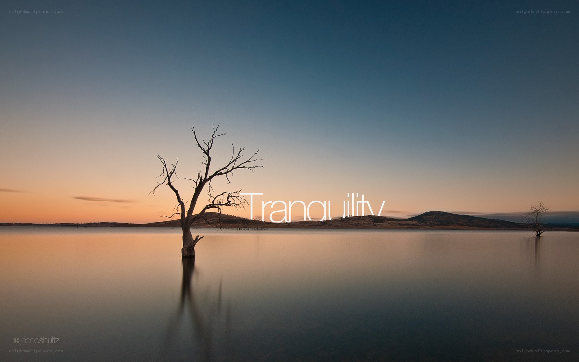 Tranquil lake at sunset