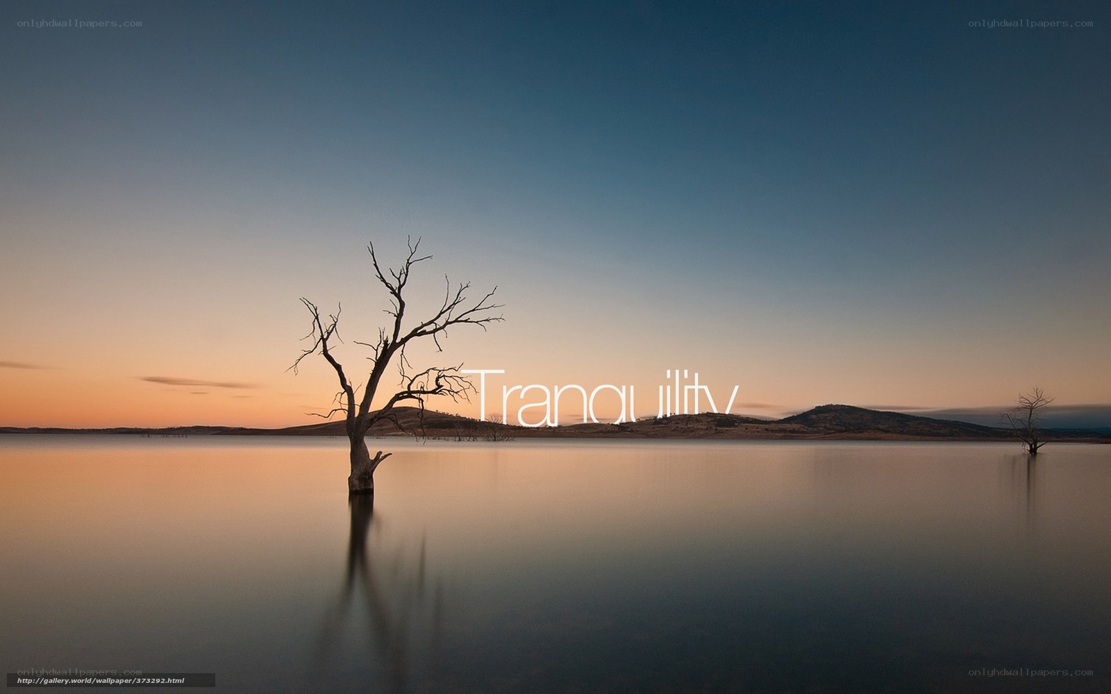 tranquil lake at sunset