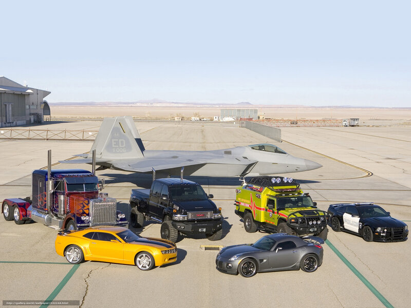 Transformers vehicles and jet on airfield