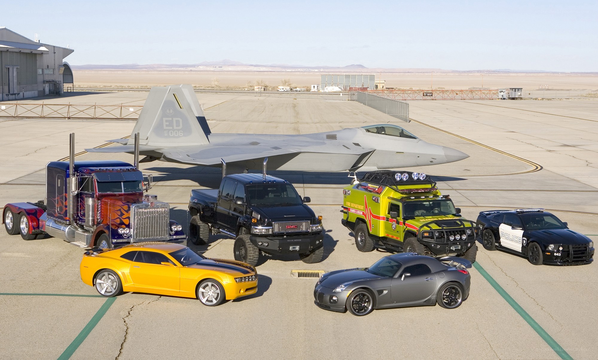 Transformers vehicles on airfield