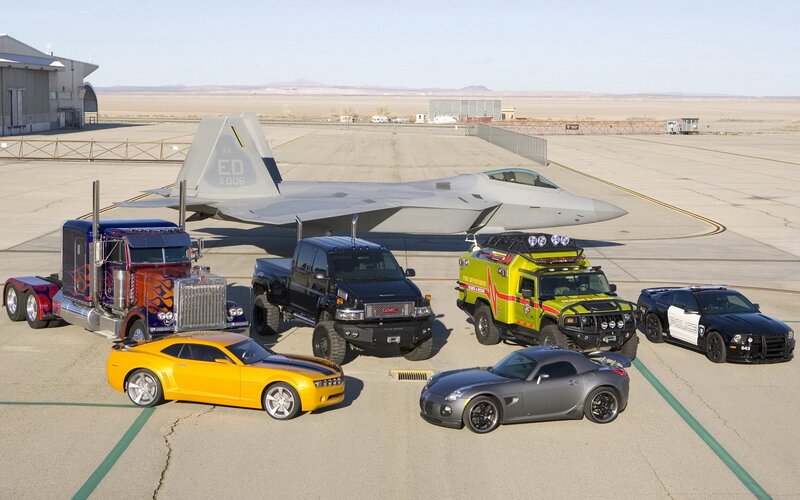 Transformers vehicles on airfield