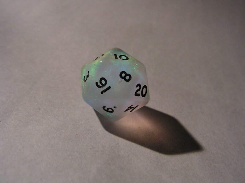 translucent d20 die