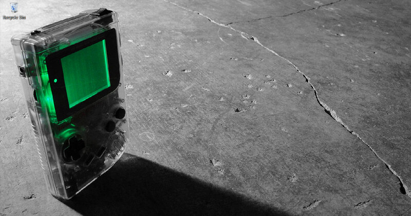 transparent game console on concrete