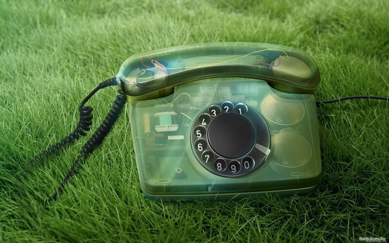 Transparent phone on grass