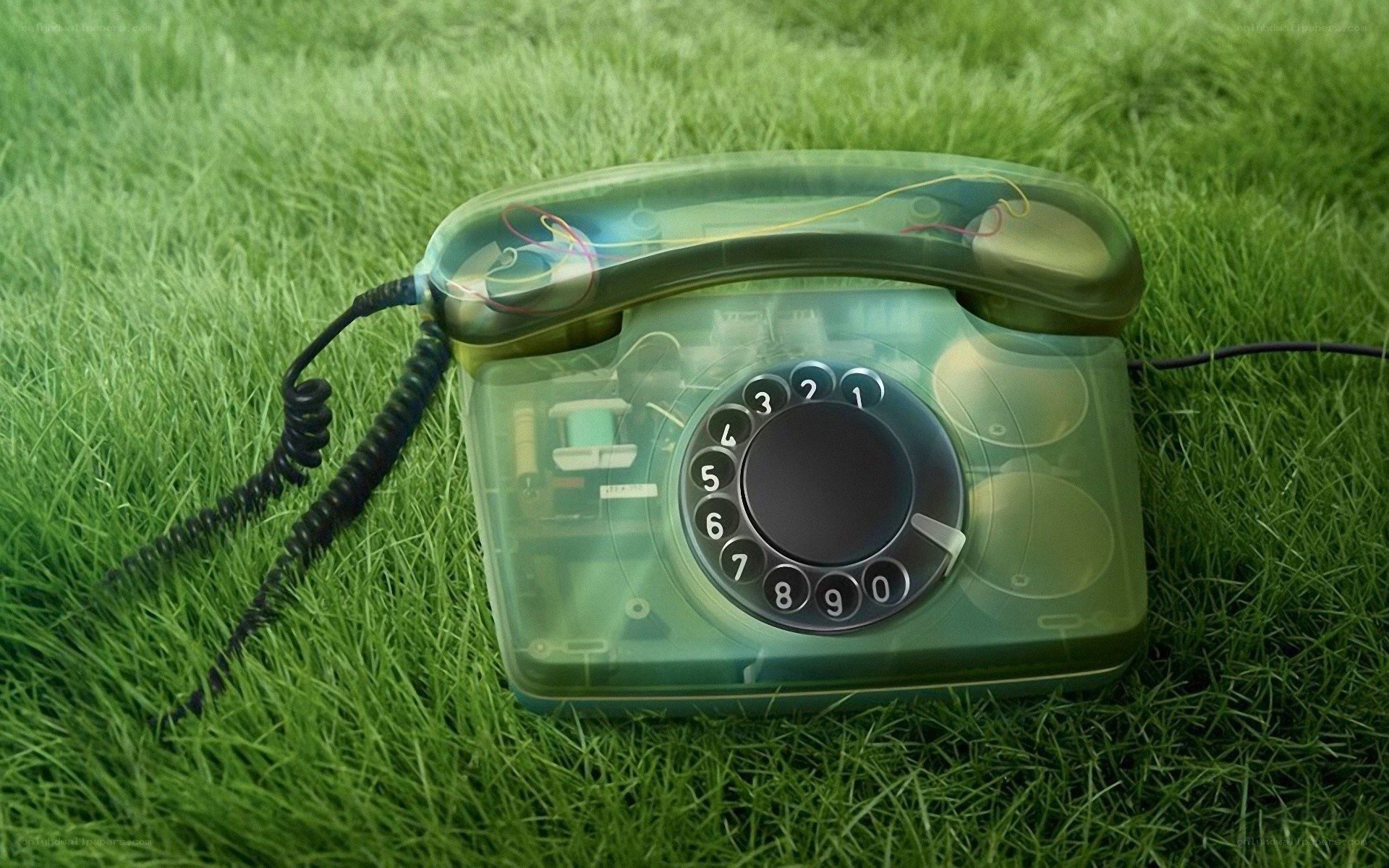 Transparent phone on grass