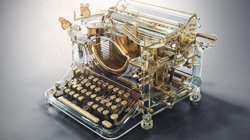 Transparent typewriter with butterflies