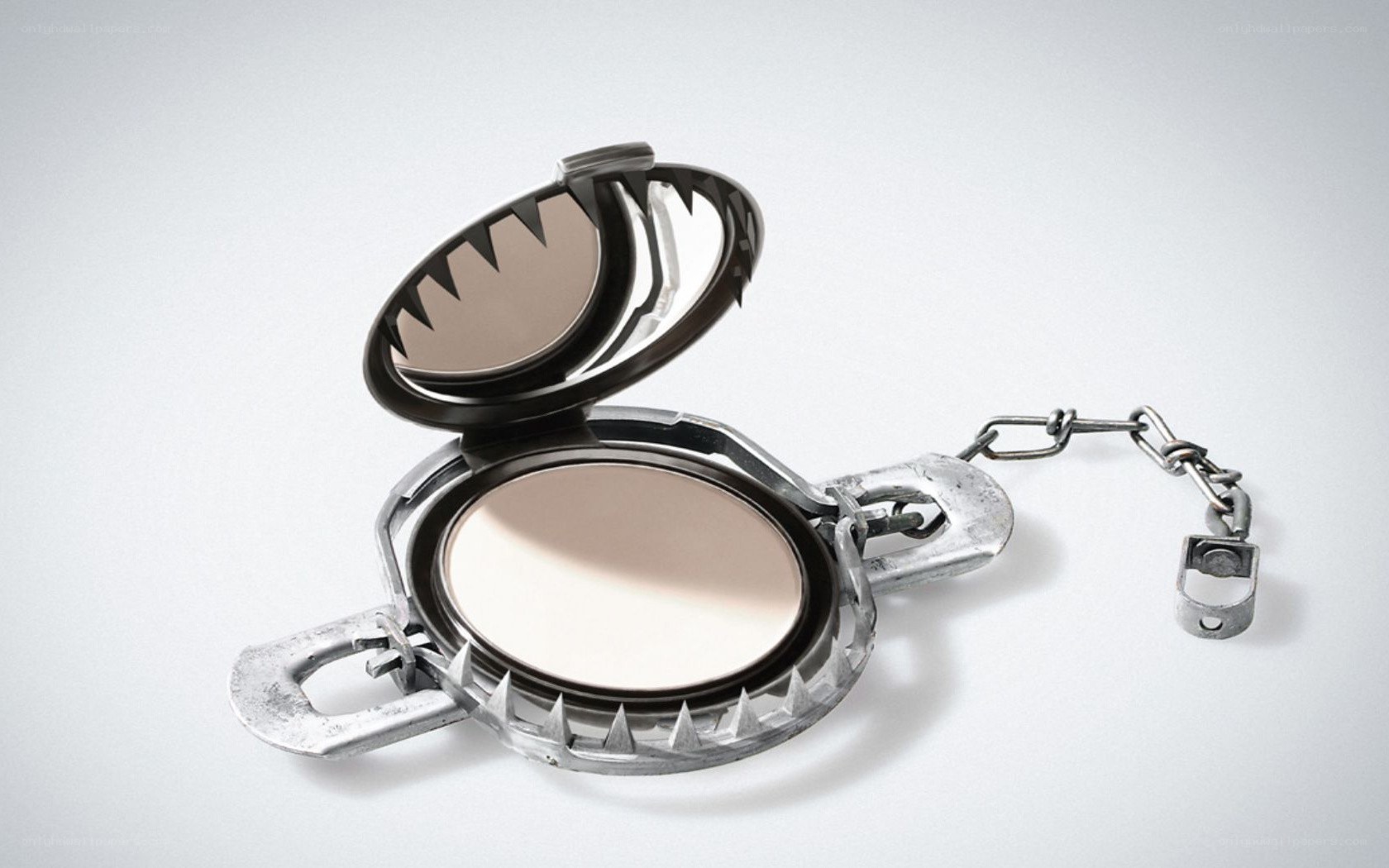 trap-shaped makeup compact