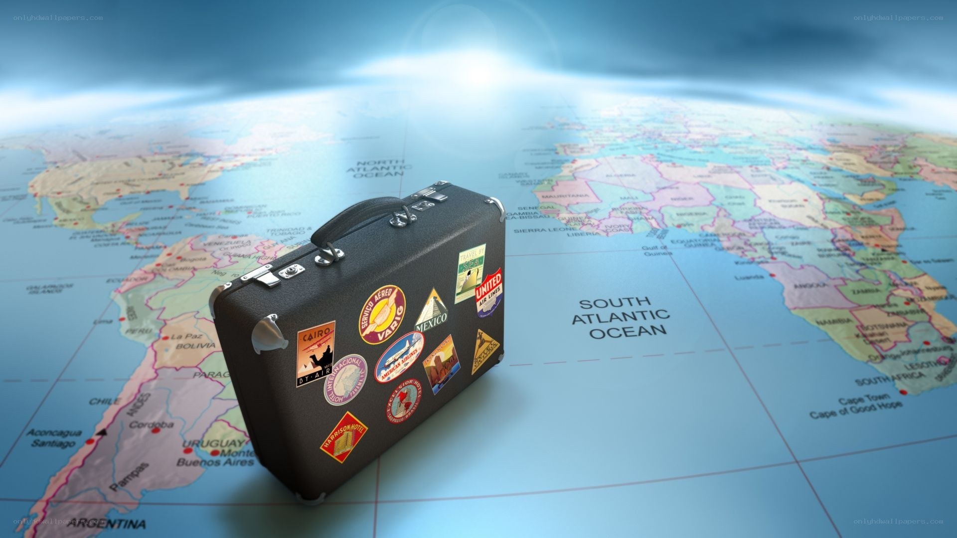 travel suitcase on world map