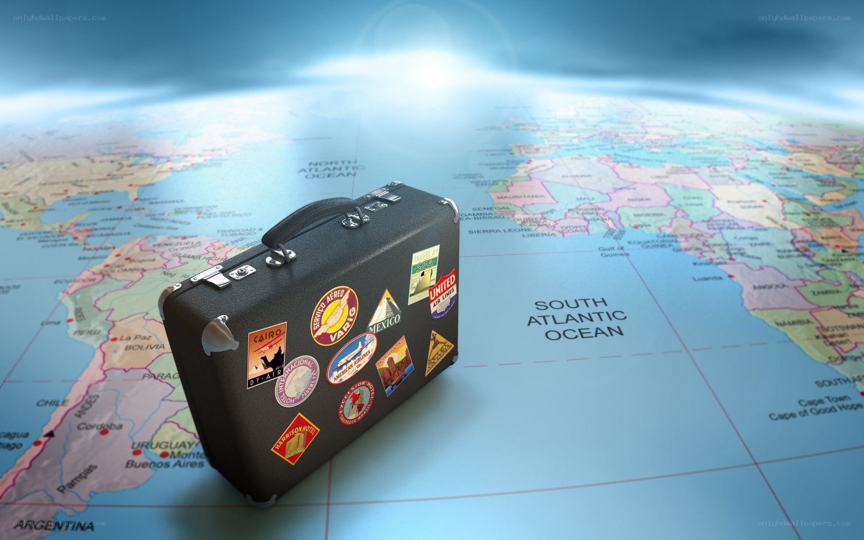 travel suitcase on world map