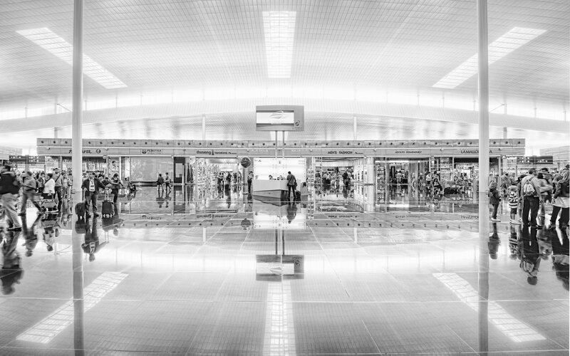 Travelers in Airport Terminal
