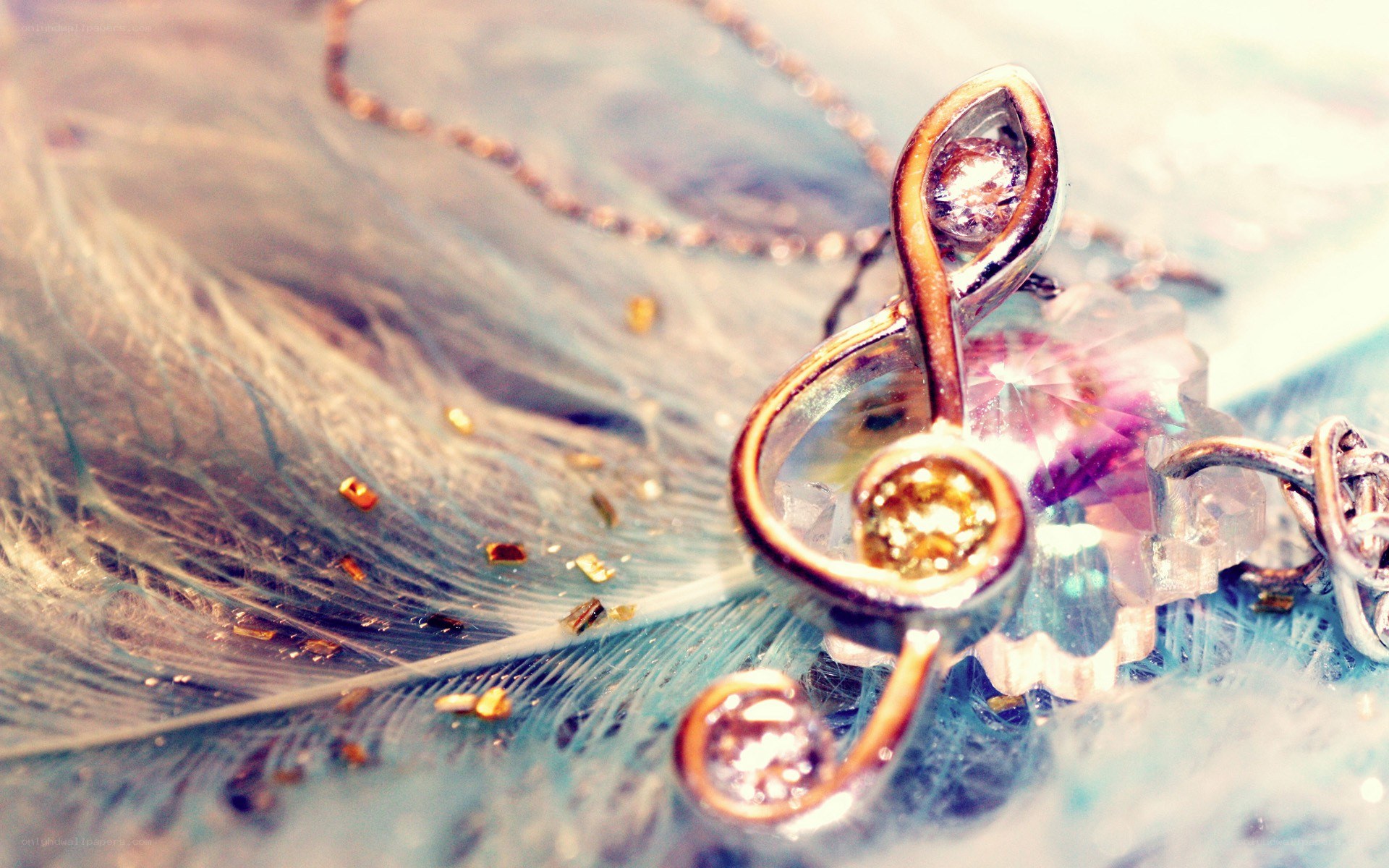 treble clef pendant on feather