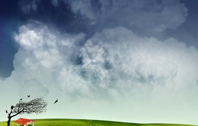 Tree and House under Storm Clouds