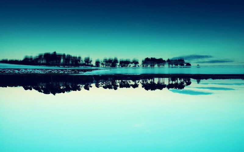 Trees Reflected in Water — Blue, Serene, Sunset
