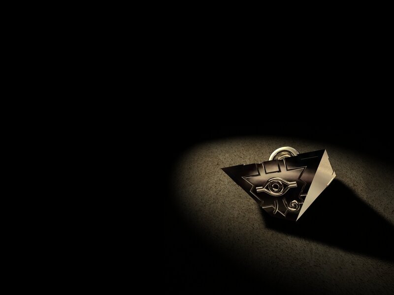 Triangular Artifact with Eye Symbol