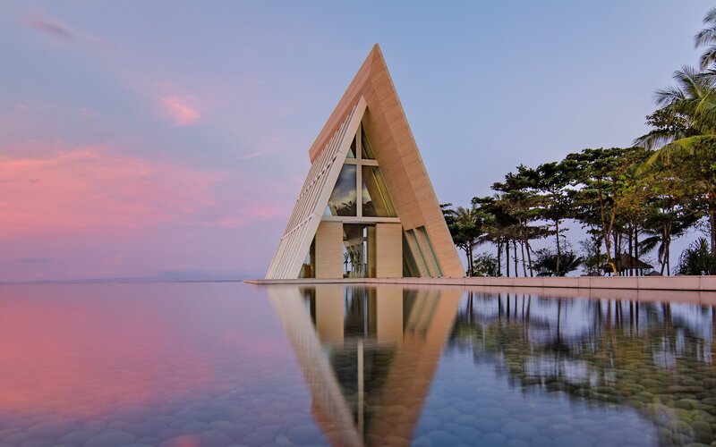 Triangular Chapel by Water — Pink, Serene, Sunset, Photograph, Trees