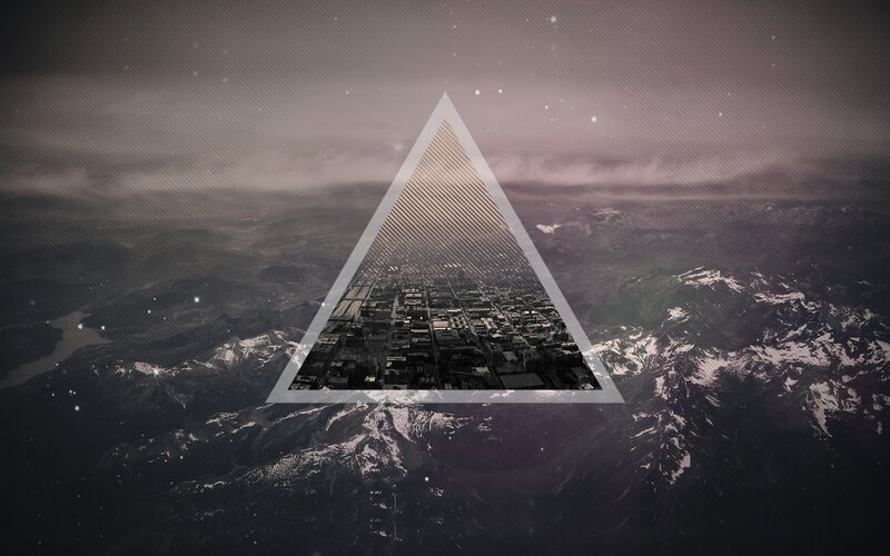triangular cityscape over mountains