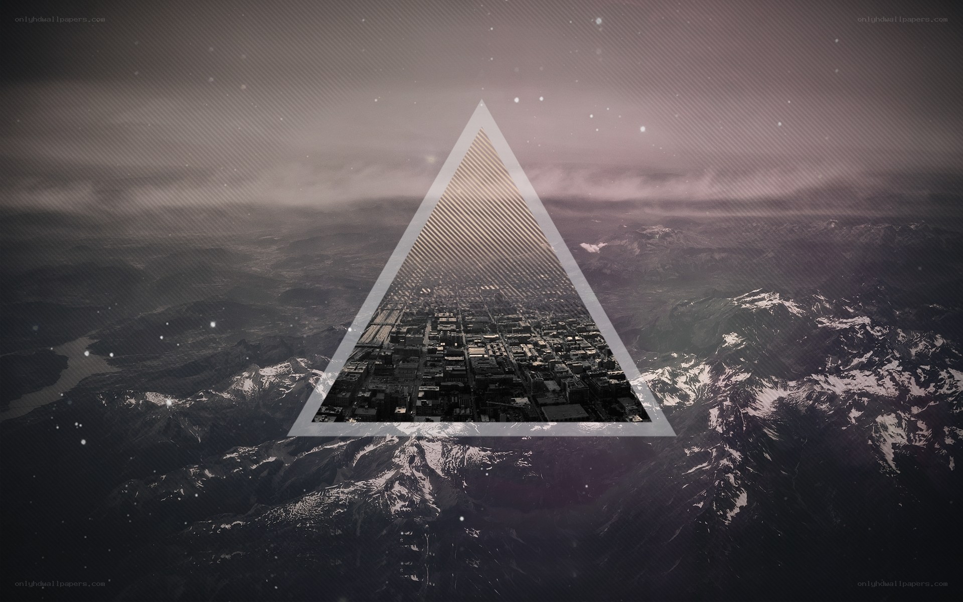 triangular cityscape over mountains