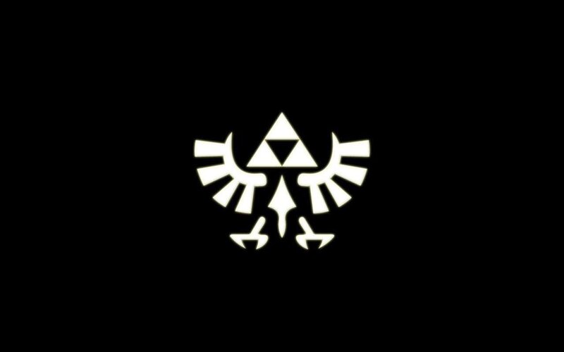 Triforce symbol on black background
