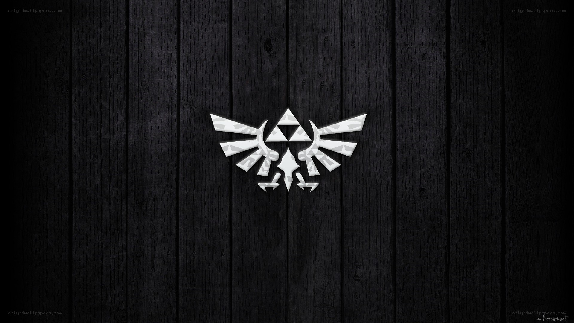 Triforce symbol on dark wood