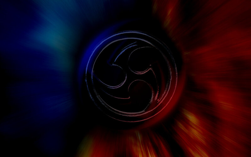 triple comma symbol on dark background