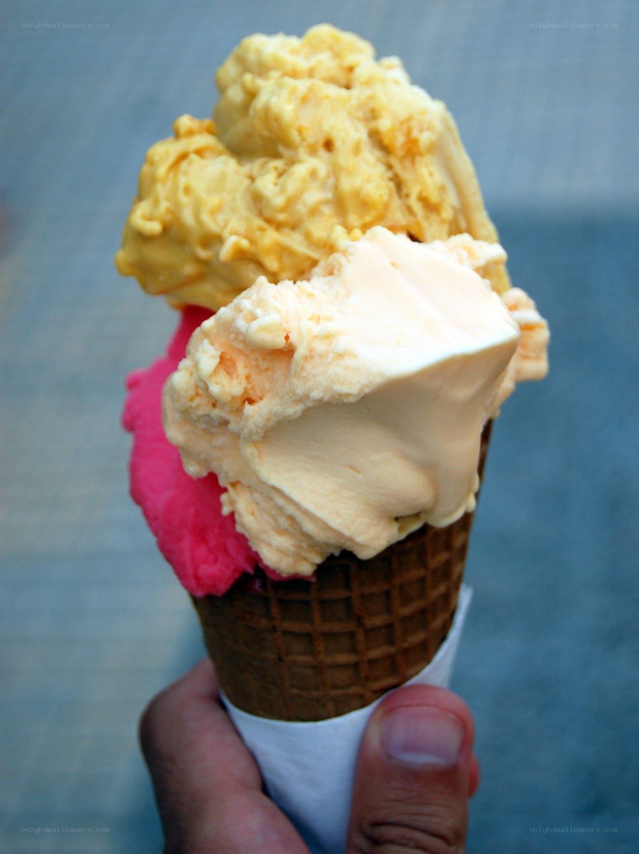 Triple scoop ice cream cone